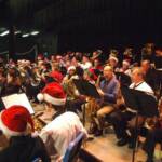 Band members joined in with their own Santa hats.