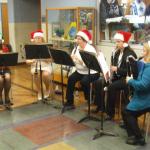 Mercer Community Band Woodwind Quintet performed before the concert in the lobby.