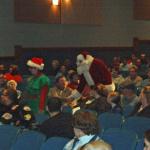 Santa greeted member of the audience on his way to the stage.