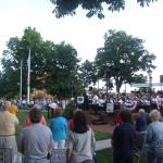 Flag raising and "The Star Spangled Banner", sung by Matt Younger.